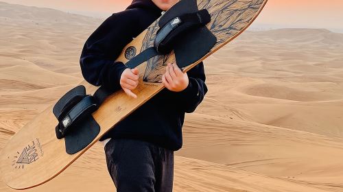 Morning Red Dune Safari with Sandboarding and Camel Ride Day Tours