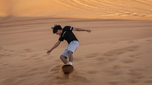 Premium Red Dunes Bashing with Quad Bike, Camel, Falcon &VIP Camp Day Tours