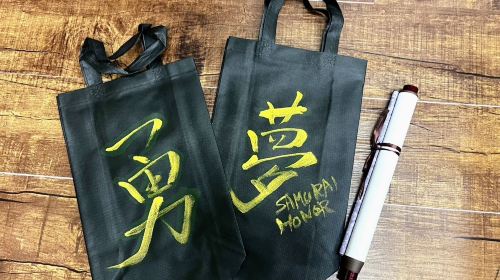 Learn Japanese calligraphy (Shodo) and Zen while wearing a kimono near Osaka Castle