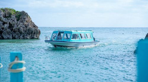 Half-day tour to Mibaru Beach marine park in Okinawa: glass boat, snorkeling, SUP, canoe and fishing experience
