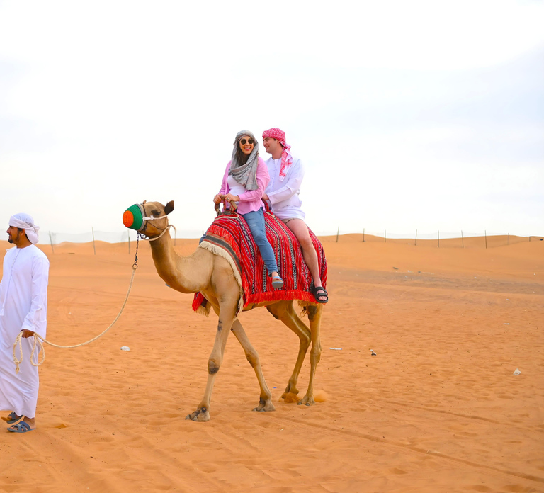Dubai: Tour with BBQ Dinner, Camel Ride, & Traditional Show