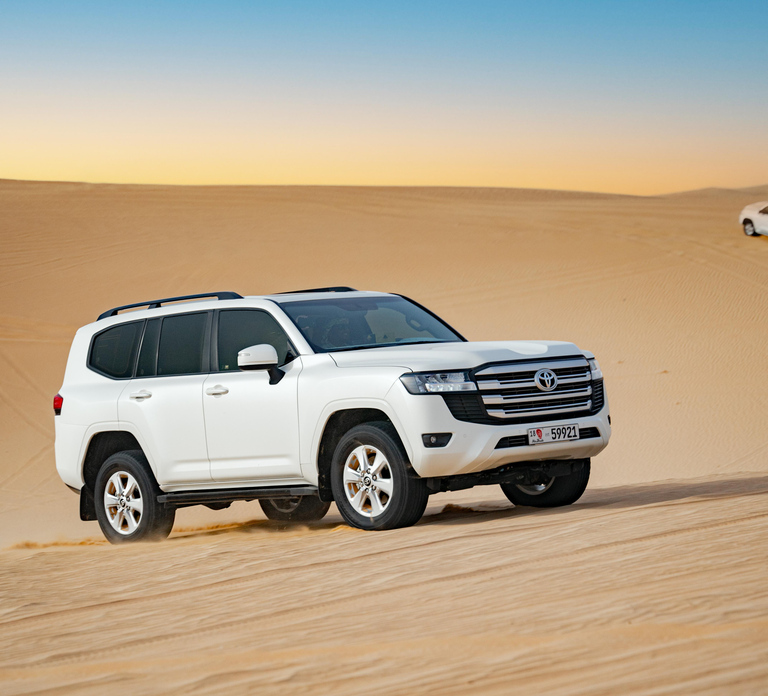 Abu Dhabi: Morning Dune Drive, Camel Ride & Sandboarding