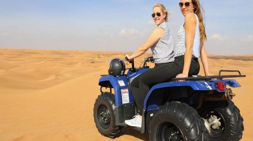 Red Dunes Safari by Quad Bike, Camel Ride, Sandboarding and BBQ at Al Khayma Camp Day Tours