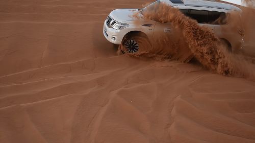 Dune Bashing with Quad Bike and Sand Boarding from Dubai
