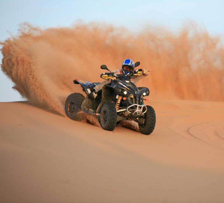 Dubai: Evening Tour with Quad Biking, Camel Ride, and BBQ