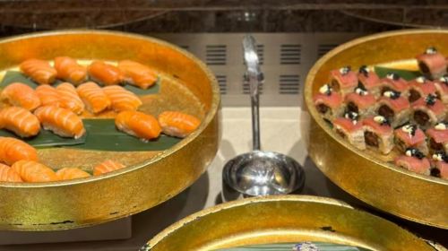 Saffron Restaurant in Dubai offers a diverse selection of international themed buffet dishes that change daily, with beverages included.