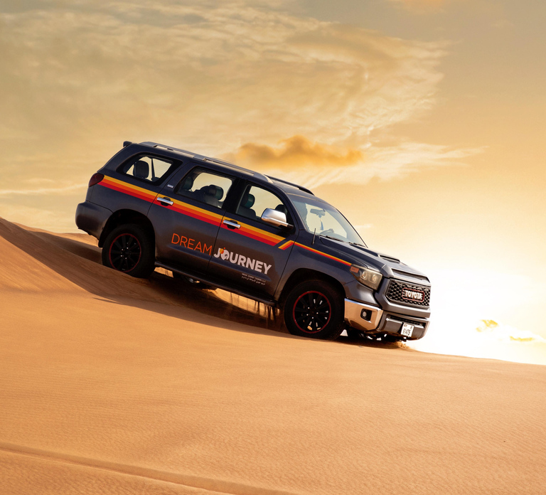 Dubai: Desert Safari with Sandboarding, Quad Bike, and BBQ