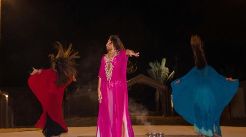 Red Dunes Safari by Quad Bike, Camel Ride, Sandboarding and BBQ at Al Khayma Camp Day Tours