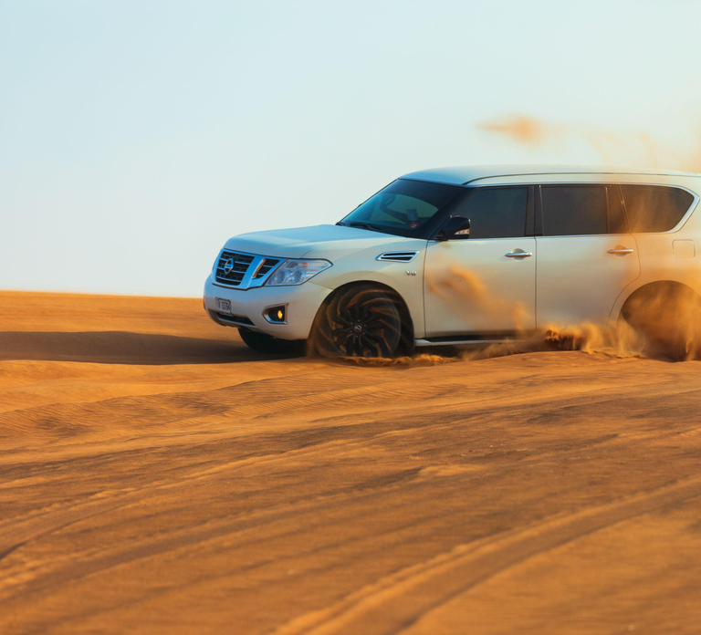 Abu Dhabi: Desert Safari, Quad Bike, Camels & Sandboarding