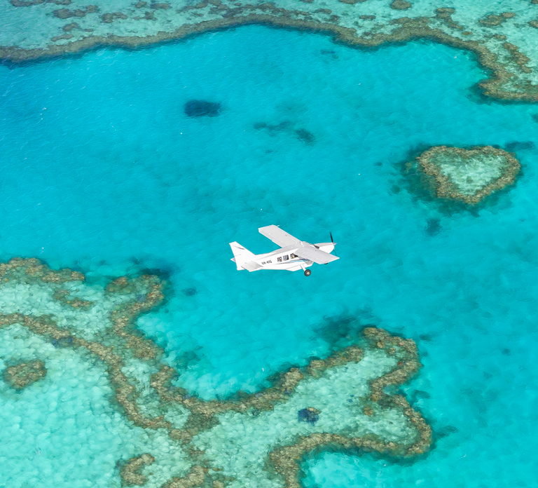 Airlie Beach: Fly Raft Package w Scenic Flight & Snorkeling