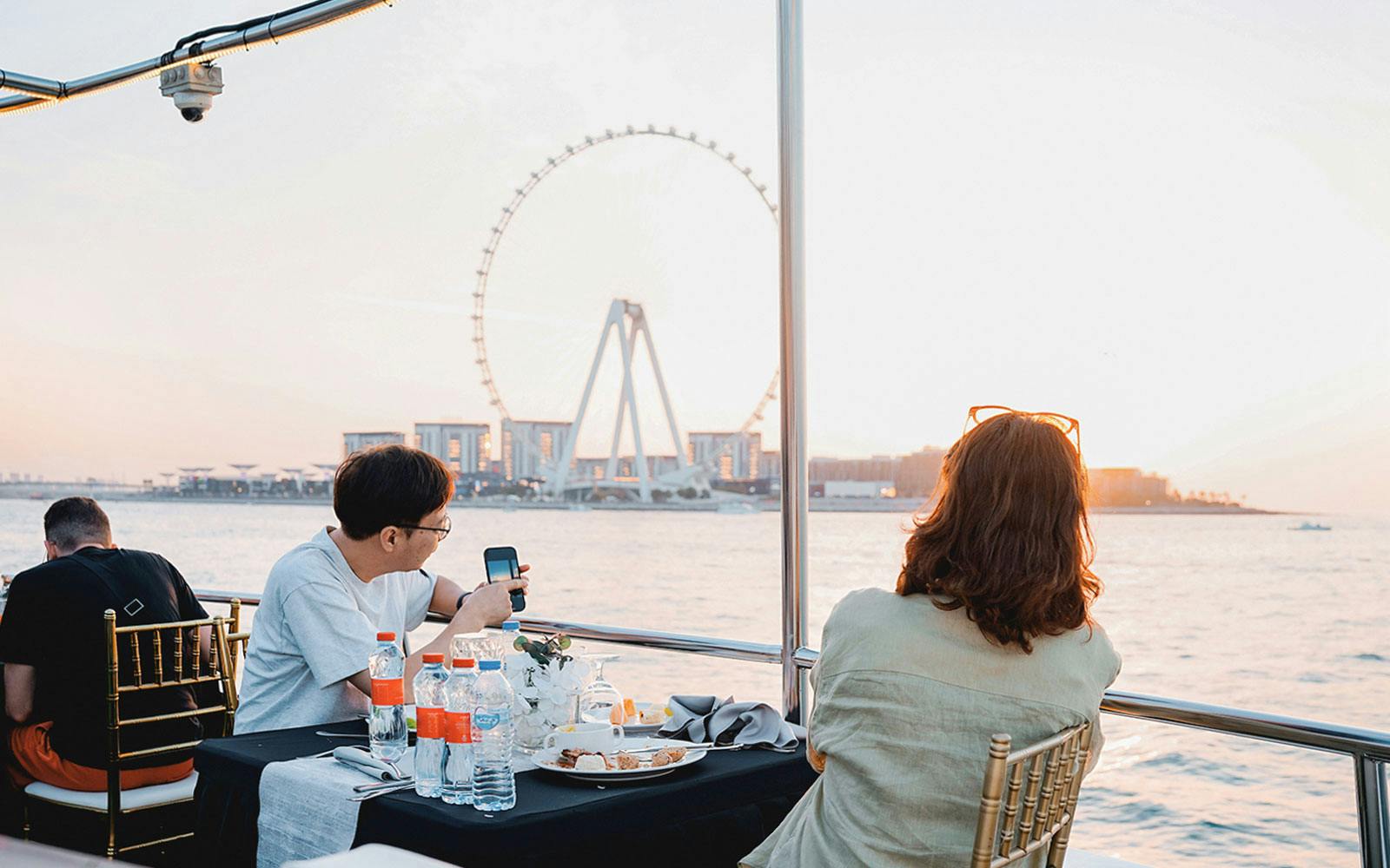 From Dubai Marina: 1.5-Hour Sunset/Dinner Cruise with Open Bar, Live Music & International Buffet