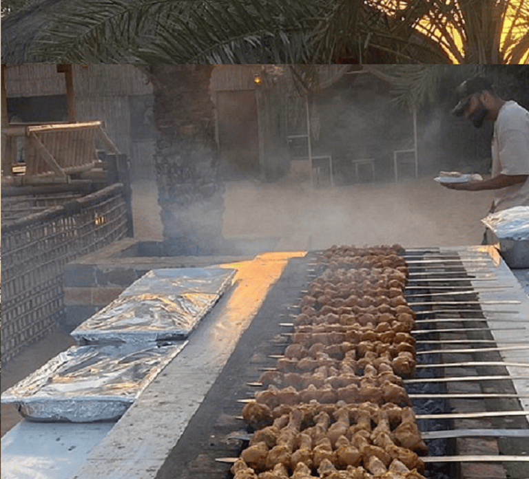 Dubai: Evening Tour with Quad Biking, Camel Ride, and BBQ