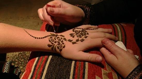 Abu Dhabi Sunset Dune Bashing at Rose Camp with Camel Ride Around Oasis Show + Transfer & Buffet
