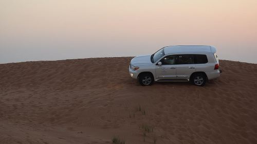 Dune Bashing with Quad Bike and Sand Boarding from Dubai