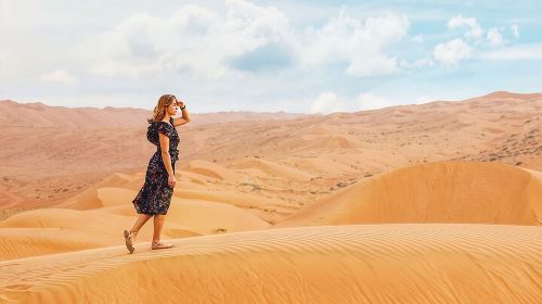 Private Morning Red Dune Safari with Camel Ride & Sandboarding