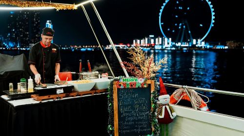 Luxury Dubai Sunset & Dinner Cruise (90min) on Glass Boat with International Buffet & Live Music Transport Passes