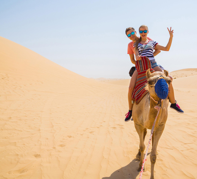Dubai: Red Dunes Quad Bike with Sandboarding, Camels and BBQ